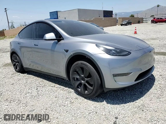 2024 Tesla Model Y Long Range with VIN 7SAYGDEE0RA288420, listed as a Copart auction lot 59159015 with 7,831 mi miles and Salvage title. Bid and sale history available at DreamBid. Image 13.