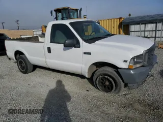 2002 Ford Super Duty F-250 XL with VIN 1FTNF20L52ED47162, listed as a Copart auction lot 79675304 with 216,687 mi miles and Salvage Title. Bid and sale history available at carsss.com. Image 4.