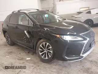 2021 Lexus RX with VIN 2T2HZMDA2MC264539, listed as a IAAI auction lot 41124586 with 94,410 mi miles. Bid and sale history available at carsss.com. Image 1.