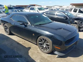 2016 Dodge Challenger R/T Scat Pack z VIN 2C3CDZFJ7GH217691, wystawiony jako IAAI lot #42228253 z przebiegiem 120 226 mil mil oraz . Historia ofert i sprzedaży dostępna na DreamBid. Obrazek 1.