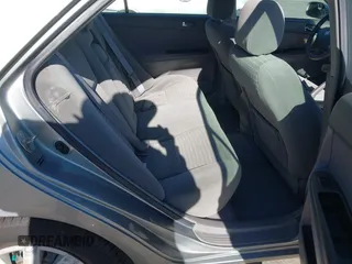 2005 Toyota Camry LE z VIN 4T1BE30K65U543152, wystawiony jako IAAI lot #42183864 z przebiegiem 228 285 mil mil oraz . Historia ofert i sprzedaży dostępna na DreamBid. Obrazek 8.