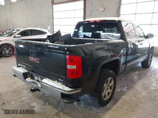 2015 GMC Sierra 1500 SLT with VIN 3GTU2VEC4FG251264, listed as a IAAI auction lot 40883499 with 207,004 mi miles. Bid and sale history available at carsss.com. Image 4.