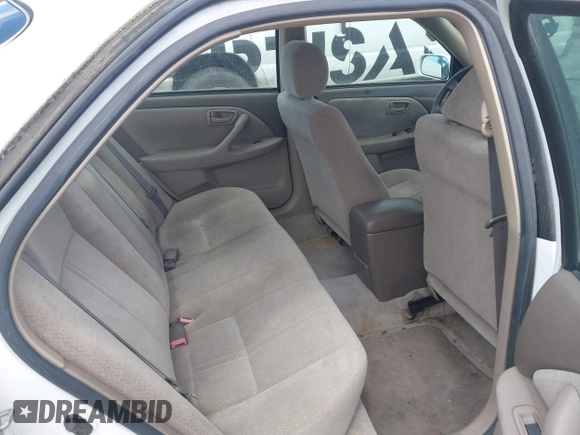 2001 Toyota Camry LE z VIN JT2BF22K310304712, wystawiony jako IAAI lot #42386743 z przebiegiem 103 552 mil mil oraz . Historia ofert i sprzedaży dostępna na DreamBid. Obrazek 8.