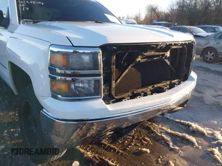 2014 Chevrolet Silverado 1500 LT with VIN 1GCVKREH4EZ148979, listed as a IAAI auction lot 41215714 with 193,710 mi miles and . Bid and sale history available at DreamBid. Image 17.