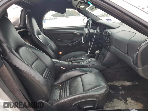2001 Porsche Boxster с VIN WP0CA29821U621779, выставлен на аукционе Copart как лот 87204984 с пробегом 82 091 миль миль и Списание • Salvage title. История ставок и продаж доступна на DreamBid. Изображение 10.