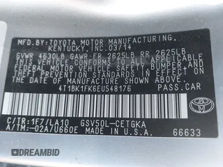 2014 Toyota Camry SE with VIN 4T1BK1FK6EU548176, listed as a IAAI auction lot 41392975 with 143,249 mi miles. Bid and sale history available at carsss.com. Image 9.