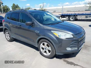 2015 Ford Escape SE with VIN 1FMCU0G78FUB96030, listed as a IAAI auction lot 41949876 with 172,940 mi miles. Bid and sale history available at carsss.com. Image 1.