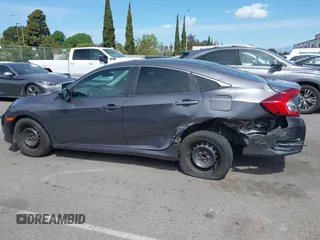 2017 Honda Civic LX with VIN 2HGFC2F52HH566363, listed as a IAAI auction lot 41934807 with 94,063 mi miles and . Bid and sale history available at DreamBid. Image 14.