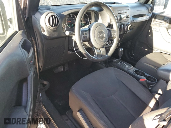 2016 Jeep Wrangler Willys Wheeler with VIN 1C4AJWAG5GL266235, listed as a Copart auction lot 50237195 with 60,830 mi miles and Salvage title. Bid and sale history available at DreamBid. Image 8.