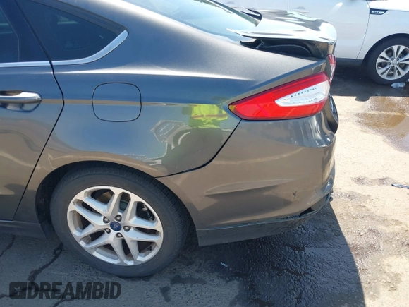 2015 Ford Fusion SE with VIN 3FA6P0H7XFR306483, listed as a IAAI auction lot 42033062 with 159,922 mi miles and . Bid and sale history available at DreamBid. Image 18.