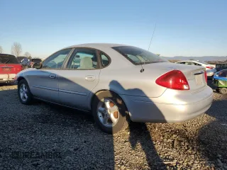 2000 Ford Taurus SE with VIN 1FAFP53U7YG259840, listed as a Copart auction lot 42412595 with 125,226 mi miles and Salvage Title. Bid and sale history available at DreamBid. Image 2.