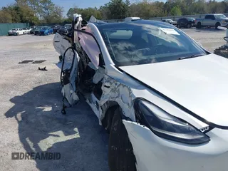 2023 Tesla Model Y Long Range with VIN 7SAYGAEE1PF665934, listed as a IAAI auction lot 41780949 with 21,949 mi miles and . Bid and sale history available at DreamBid. Image 6.