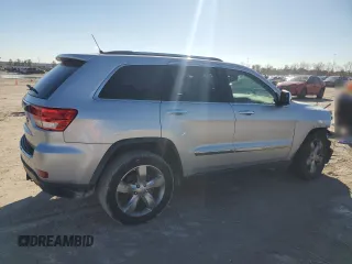 2013 Jeep Grand Cherokee Overland with VIN 1C4RJECG4DC644809, listed as a Copart auction lot 42265005 with 213,493 mi miles and Salvage Title. Bid and sale history available at carsss.com. Image 3.
