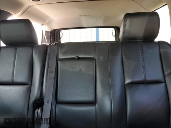 2014 Chevrolet Suburban LT with VIN 1GNSKJE77ER193143, listed as a Copart auction lot 54311935 with 171,407 mi miles and Salvage Title. Bid and sale history available at DreamBid. Image 10.
