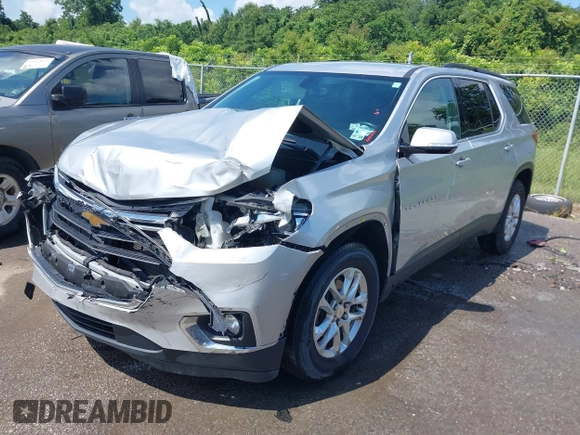 2019 Chevrolet Traverse LT Cloth z VIN 1GNERGKW3KJ293483, wystawiony jako IAAI lot #42524003 z przebiegiem 82 611 mil mil oraz . Historia ofert i sprzedaży dostępna na DreamBid. Obrazek 17.
