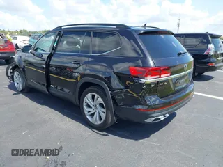 2021 Volkswagen Atlas SE with VIN 1V2WR2CA1MC607768, listed as a IAAI auction lot 42518885 with 49,286 mi miles and . Bid and sale history available at DreamBid. Image 3.