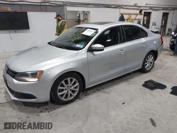 2014 Volkswagen Jetta Sedan SE w/Connectivity/Sunroof PZEV with VIN 3VWD17AJ9EM437804, listed as a IAAI auction lot 42026842 with 83,114 mi miles. Bid and sale history available at carsss.com. Image 2.
