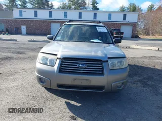 2007 Subaru Forester X with VIN JF1SG63627H747415, listed as a IAAI auction lot 42051221 with 200,763 mi miles. Bid and sale history available at carsss.com. Image 6.