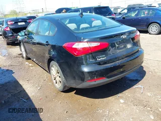 2014 Kia Forte LX with VIN KNAFX4A63E5230865, listed as a IAAI auction lot 41983560 with 103,275 mi miles and . Bid and sale history available at carsss.com. Image 3.