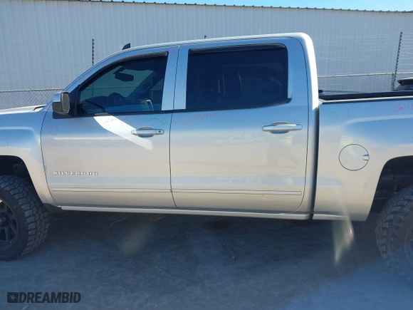 2015 Chevrolet Silverado 1500 LT with VIN 3GCUKREH1FG269823, listed as a IAAI auction lot 41398008 with 210,788 mi miles. Bid and sale history available at carsss.com. Image 14.