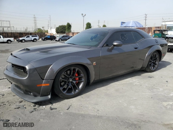 2021 Dodge Challenger R/T Scat Pack Widebody with VIN 2C3CDZFJ6MH571780, listed as a Copart auction lot 79668914 with 39,236 mi miles and Salvage Title. Bid and sale history available at carsss.com. Image 1.