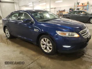 2012 Ford Taurus SEL with VIN 1FAHP2EW2CG143718, listed as a Copart auction lot 55443865 with 212,996 mi miles and Clean Title. Bid and sale history available at DreamBid. Image 4.