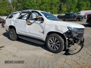 2021 Chevrolet Tahoe LT with VIN 1GNSCNKD1MR363008, listed as a Copart auction lot 51953455 with 77,353 mi miles and Salvage title. Bid and sale history available at DreamBid. Image 4.