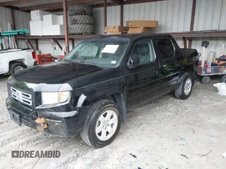 2007 Honda Ridgeline RTL with VIN 2HJYK16547H549241, listed as a IAAI auction lot 42282477 with 214,685 mi miles and . Bid and sale history available at DreamBid. Image 18.