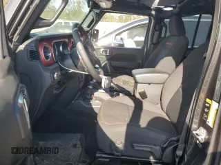 2023 Jeep Gladiator Rubicon с VIN 1C6JJTBGXPL574702, выставлен на аукционе Copart как лот 75914474 с пробегом 10 506 миль миль и Списание • Salvage title. История ставок и продаж доступна на DreamBid. Изображение 7.