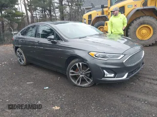 2019 Ford Fusion Titanium with VIN 3FA6P0D93KR124299, listed as a IAAI auction lot 40182478 with 73,408 mi miles. Bid and sale history available at carsss.com. Image 1.