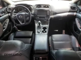 2017 Nissan Maxima Platinum with VIN 1N4AA6APXHC444065, listed as a Copart auction lot 58602495 with 93,446 mi miles and Salvage title. Bid and sale history available at DreamBid. Image 8.