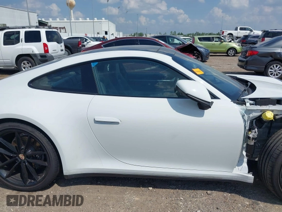 2022 Porsche 911 Carrera with VIN WP0AA2A91NS206000, listed as a IAAI auction lot 40382242 with 26,394 mi miles. Bid and sale history available at carsss.com. Image 14.
