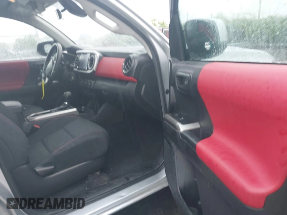 2023 Toyota Tacoma SR with VIN 3TYAX5GN0PT071080, listed as a IAAI auction lot 42426897 with 58,017 mi miles and . Bid and sale history available at DreamBid. Image 5.