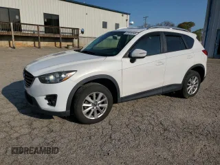 2016 Mazda CX-5 Touring with VIN JM3KE4CY1G0887032, listed as a Copart auction lot 51570765 with 164,884 mi miles and Clean Title. Bid and sale history available at carsss.com. Image 1.