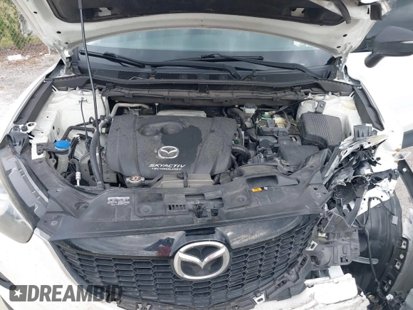 2015 Mazda CX-5 Touring with VIN JM3KE2CY8F0545967, listed as a IAAI auction lot 41909920 with 101,781 mi miles. Bid and sale history available at carsss.com. Image 10.
