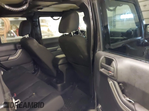 2016 Jeep Wrangler Unlimited Sport with VIN 1C4BJWDG9GL114359, listed as a IAAI auction lot 41422535 with 133,462 mi miles and . Bid and sale history available at DreamBid. Image 8.