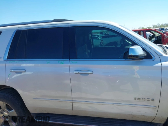 2016 Chevrolet Tahoe LTZ with VIN 1GNSCCKC1GR404754, listed as a IAAI auction lot 41831879 with 139,681 mi miles and . Bid and sale history available at DreamBid. Image 13.