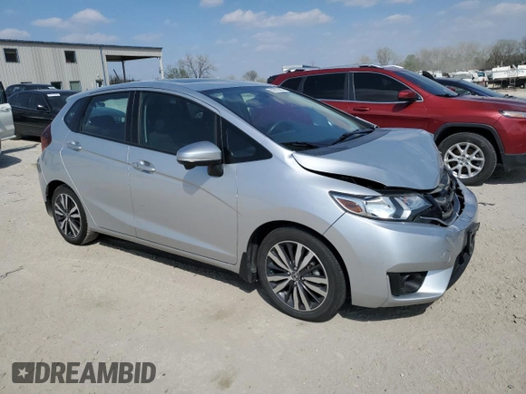 2015 Honda Fit EX with VIN 3HGGK5G89FM744818, listed as a Copart auction lot 52977685 with 99,719 mi miles and Clean title. Bid and sale history available at DreamBid. Image 4.