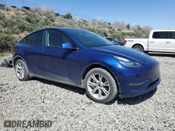 2023 Tesla Model Y Long Range with VIN 7SAYGDEE3PA106609, listed as a Copart auction lot 53839315 with 24,077 mi miles and Salvage Title. Bid and sale history available at DreamBid. Image 4.