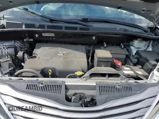 2015 Toyota Sienna XLE with VIN 5TDYK3DC1FS611521, listed as a IAAI auction lot 42136356 with 102,734 mi miles. Bid and sale history available at carsss.com. Image 10.
