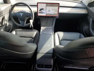 2021 Tesla Model 3 Standard Range Plus z VIN 5YJ3E1EAXMF870285, wystawiony jako Copart lot #53251375 z przebiegiem 64 085 mil mil oraz Szkody całkowita. Historia ofert i sprzedaży dostępna na DreamBid. Obrazek 8.