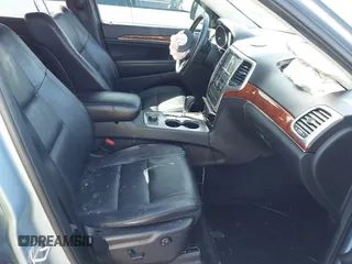 2012 Jeep Grand Cherokee Limited z VIN 1C4RJFBTXCC341813, wystawiony jako IAAI lot #41791662 z przebiegiem 120 811 mil mil oraz . Historia ofert i sprzedaży dostępna na DreamBid. Obrazek 5.