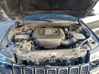 2019 Jeep Grand Cherokee Altitude with VIN 1C4RJEAG2KC698822, listed as a IAAI auction lot 41476562 with 128,035 mi miles and . Bid and sale history available at DreamBid. Image 10.