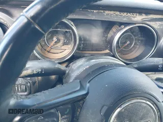 2022 Jeep Gladiator Willys z VIN 1C6JJTAM4NL130350, wystawiony jako IAAI lot #41964484 z przebiegiem Nie podano mil oraz . Historia ofert i sprzedaży dostępna na DreamBid. Obrazek 12.