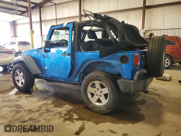 2015 Jeep Wrangler Freedom Edition z VIN 1C4AJWAG7FL520090, wystawiony jako Copart lot #62756975 z przebiegiem Nie podano mil oraz Szkoda całkowita • Salvage title. Historia ofert i sprzedaży dostępna na DreamBid. Obrazek 2.