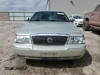 2004 Mercury Grand Marquis GS z VIN 2MEFM74W94X601693, wystawiony jako Copart lot #56303935 z przebiegiem 98 674 mil mil oraz Czysty tytuł • Clean title. Historia ofert i sprzedaży dostępna na DreamBid. Obrazek 5.