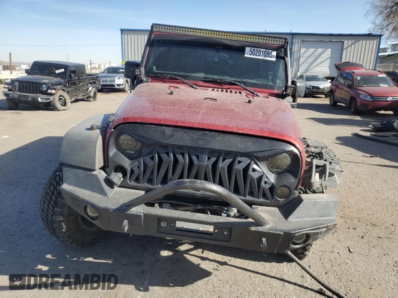 2012 Jeep Wrangler Unlimited Rubicon с VIN 1C4HJWFG6CL109735, выставлен на аукционе Copart как лот 50201085 с пробегом 107 312 миль миль и Списание • Salvage title. История ставок и продаж доступна на DreamBid. Изображение 5.