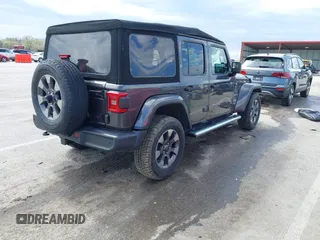 2019 Jeep Wrangler Unlimited Sahara with VIN 1C4HJXEN3KW622167, listed as a IAAI auction lot 41880702 with 72,928 mi miles and . Bid and sale history available at DreamBid. Image 4.