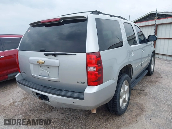 2011 Chevrolet Tahoe LT with VIN 1GNSCBE05BR190310, listed as a IAAI auction lot 42243623 with 249,453 mi miles and . Bid and sale history available at DreamBid. Image 4.