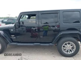2008 Jeep Wrangler Unlimited Sahara с VIN 1J4GA59188L624010, выставлен на аукционе IAAI как лот 42115574 с пробегом 105 800 миль миль и . История ставок и продаж доступна на DreamBid. Изображение 14.
